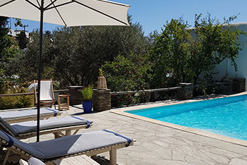 The pool area of Andromeda in Sifnos